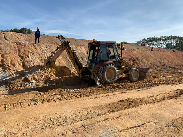 Backhoe school site job